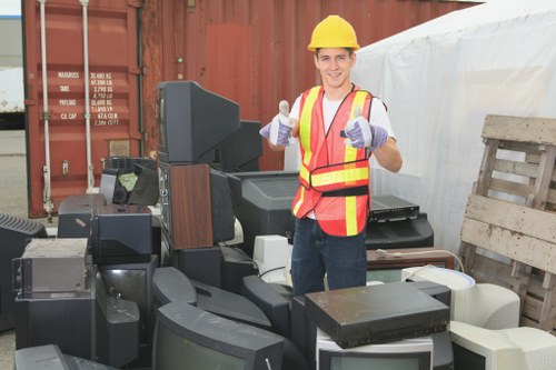 House clearance team organizing items in a Loughton home