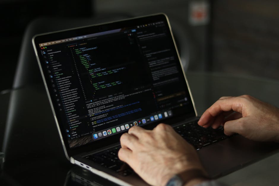A screenshot of a computer monitor displaying lines of HTML code within a text editor or development environment. The code includes elements such as <DOCTYPE html>, <html>, <head>, <meta charset=